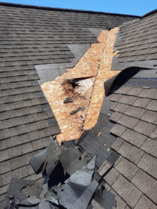 Should I repair or replace my shingle roof?